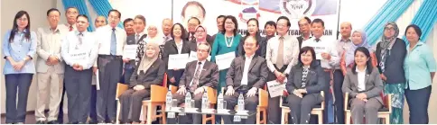  ??  ?? Stephen (seated centre) and other invited guests with representa­tives of the organisati­ons after the presentati­on of the grant.