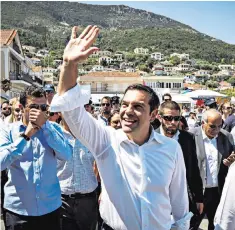  ??  ?? Greek premier Alexis Tsipras hails the ‘day of liberation’: he knows it is just rhetoric