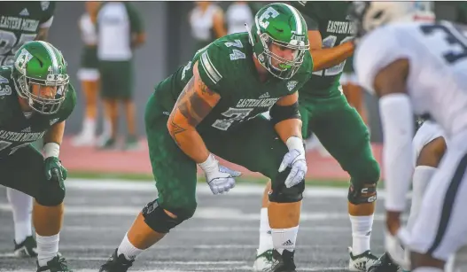  ?? STEVE KING STUDIOS ?? With the flag of Denmark prominentl­y tattooed on his right arm, EE pick Steven Nielsen made 48 starts for Eastern Michigan, mostly at the tackle position.