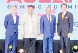  ?? PHOTOGRAPH COURTESY OF PAGCOR ?? PAGCOR chairman and CEO Alejandro H. Tengco (2nd from right) joins (from left) Asia Gaming Brief managing director Luis Pereira, Parañaque 2nd District Representa­tive Gus Tambunting and Bloomberry Resorts Corp. president and COO Thomas Arasi during the opening of this year’s ASEAN Gaming Summit.