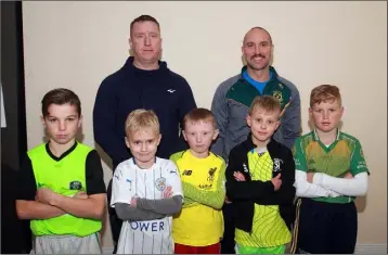  ??  ?? Bunclody Boxing Club boxers with their coaches Jonathan Kelly and Mark Sheehan.