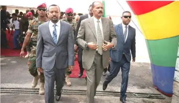  ??  ?? File photo shows Afwerki and Ahmed arriving for an inaugurati­on ceremony marking the reopening of the Eritrean embassy in Addis Ababa, Ethiopia. — Reuters photo