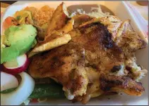  ??  ?? The Pollo Asado from Los Agaveros on South University Avenue is almost a whole chicken for $8. (Arkansas Democrat-Gazette/Eric E. Harrison)