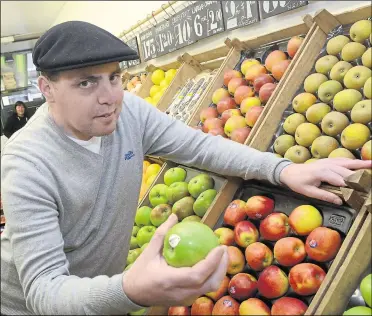  ??  ?? Mark Witts, owner of Granny Smith’s greengroce­r, who has launched free home deliveries