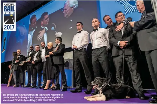  ?? JACK BOSKETT/ RAIL. ?? BTP officers and railway staff take to the stage to receive their special awards. To the right, RAIL Managing Editor Nigel Harris interviews PC Phil Healy (and Mojo).