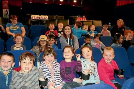  ?? CATHERINE GROENESTEI­N ?? Room 4 from Hawera Primary School went to the movies with celebrity guest Leanna Cooper, from Sticky TV (centre).