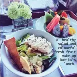  ??  ?? A healthy salad and colourful fresh fruit make up Davika's
lunch.
