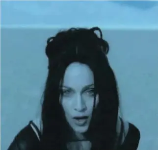  ?? WARNER BROTHERS RECORDS ?? Madonna’s 1998 video for the song Frozen is a deliberate­ly bleak presentati­on.