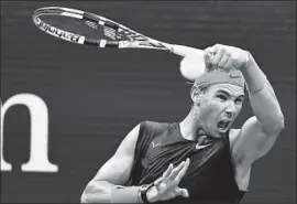  ?? Johannes Eisele AFP/Getty Images ?? RAFAEL NADAL FENDED off Matteo Berrettini in the U.S. Open semifinals and now faces Daniil Medvedev, whom he defeated in their only meeting.