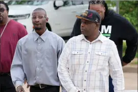  ?? ROGELIO V. SOLIS — THE ASSOCIATED PRESS ?? Michael Corey Jenkins, left, and Eddie Terrell Parker walk toward the Thad Cochran United States Courthouse in Jackson, Miss., Thursday, March 21, 2024, for sentencing on the fifth of the six former Mississipp­i Rankin County law enforcemen­t officers who committed numerous acts of racially motivated, violent torture on them in 2023. The six former law officers pleaded guilty to a number of federal charges for torturing them and their sentencing began Tuesday in federal court.