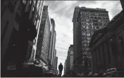  ?? ASSOCIATED PRESS ?? IN THIS FEB. 8 file photo, a pedestrian walks down South Broad Street in Philadelph­ia.