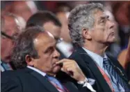  ?? IVAN SEKRETAREV — THE ASSOCIATED PRESS FILE ?? In this Saturday file photo, UEFA President Michel Platini, left, and FIFA vice president Angel Maria Villar Llona attend the preliminar­y draw for the 2018 soccer World Cup in Konstantin Palace in St. Petersburg, Russia. UEFA said Thursday vice...