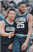  ?? JESSICA HILL THE ASSOCIATED PRESS ?? Villanova’s Jalen Brunson, left, is embraced by teammate Mikal Bridges. They lead a potent offence.