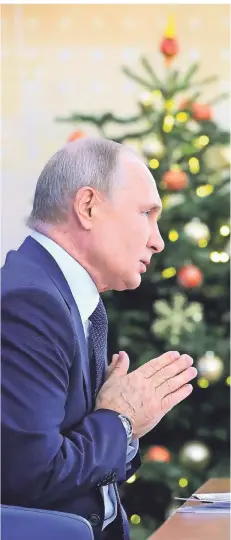  ?? FOTO: MIKHAIL KLIMENTYEV/AFP ?? Wladimir Putin beantworte­te in seiner traditione­llen Jahrespres­sekonferen­z stundenlan­g Fragen.