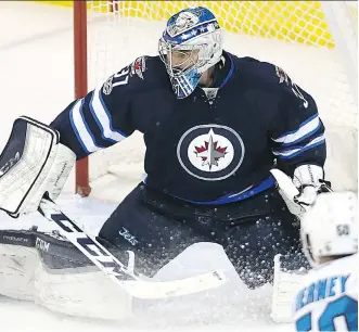  ?? KEVIN KING/FILES ?? Goalie Connor Hellebuyck signed a one-year deal with the Winnipeg Jets Monday.