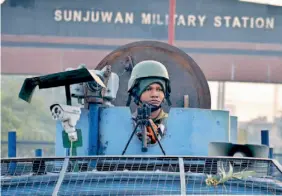  ?? PTI ?? Security personnel takes positions during a militants attack Sunjuwan Army camp in Jammu on Saturday. —