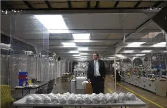  ?? ?? Jim Schmersahl, owner of Halcyon Shades, in a “clean room” used in making N-95 masks at the company’s production facility. Halcyon normally makes window shades, but when the pandemic hit, its sales fell. Halcyon applied for the state grants to make PPE as a way to try to keep its employees at work.