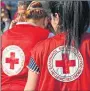  ?? ?? Red Cross workers in Greece in 2016