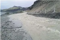  ?? PHOTO: QLDC ?? Waterway . . . The Glenorchy road turned into a river during the downpour.