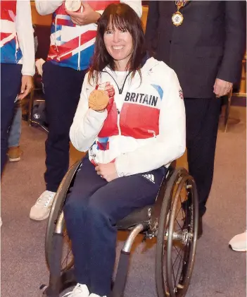  ?? ?? Jeanette Chippingto­n reflected on winning bronze in Tokyo after being awarded an OBE.