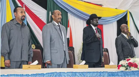  ?? AFP ?? From left, Ethiopian Prime Minister Abiy Ahmed, President of Sudan’s Transition­al Council Gen Abdel Fattah Al Burhan, President of South Sudan Salva Kiir and Uganda’s President Yoweri Museveni in Juba, South Sudan, for the start of peace talks this week