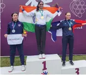  ?? ?? Diksha Dagar poses on the podium with her gold medal.