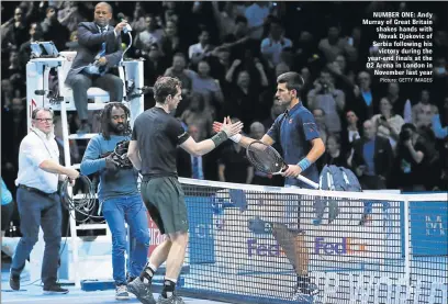  ?? Picture: GETTY IMAGES ?? NUMBER ONE: Andy Murray of Great Britain shakes hands with Novak Djokovic of Serbia following his victory during the year-end finals at the O2 Arena in London in November last year