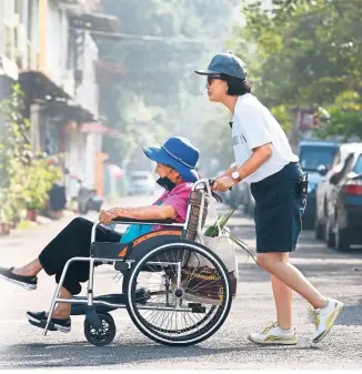  ?? — CommonWeal­th Magazine ?? Lung was inspired by her experience of caring for her dementia-stricken mother to write the bestsellin­g novel, Forever And Ever: Letters To Mei-Jun.