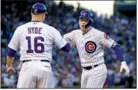  ?? AP/NAM Y. HUH ?? Albert Almora
(right) drove in the game-tying run in the seventh inning and scored the go-ahead run in the eighth inning in the Chicago Cubs’ 2-1 victory over the Washington Nationals in Game 3 of the National League division series.