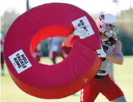  ?? ASSOCIATED PRESS PHOTOS ?? Arizona Cardinals wide receiver Krishawn Hogan runs drills during an NFL voluntary team workout May 24 in Tempe, Ariz.