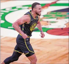  ?? CARLOS AVILA GONZALEZ/SAN FRANCISCO CHRONICLE VIA AP ?? Golden State’s Stephen Curry reacts after hitting a 3-pointer during the first quarter of Game 4 of the NBA Finals on Friday night. Curry scored 43 points when the Warriors evened the series at 2-2.