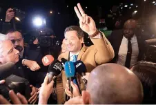  ?? — AFP photos ?? Chega leader Andre Ventura reacts as he arrives at Marriot Hotel, CHEGA’s electoral night headquarte­rs, in Lisbon.