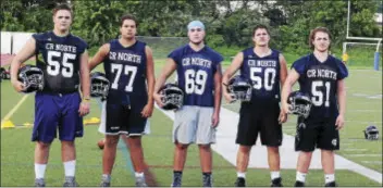  ?? STEVE SHERMAN — DIGITAL FIRST MEDIA PHOTO ?? Council Rock North returns five players to the O-line including three seniors who enter the 2016campai­gn with plenty of varsity experience. All but left guard Ethan Himes (50) started on the front five last season. Pictured, from left: RT Pat Bartlett...