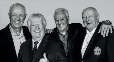  ??  ?? Teammates forever: Wayne Cashman, Pat Stapleton, Phil Esposito and Eddie Johnston. Opposite: Calm before the storm: Team Canada lines up during player introducti­ons before Game 5 of the 1972 Summit Series against Russia at the Luzhniki Ice Palace in...