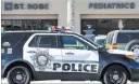  ?? Richard Brian ?? Las Vegas Review-journal Police investigat­e the scene where a child was hit by an SUV in the parking lot of a pediatrics center near South Buffalo Drive and the 215 Beltway on Monday.