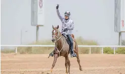  ??  ?? Mohd Ahmad Mohd Ghanim Al Marri wins the 2019 Dubai Crown Prince Endurance Cup aboard Fagor.