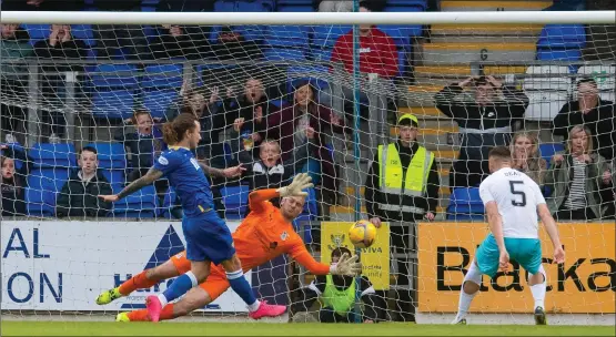  ?? ?? Stevie May scores to make it 1-0 to St Johnstone and put them ahead in the tie as Callum Davidson’s side made sure of their survival