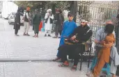  ?? SUPPLIED TO NATIONAL POST ?? Afghan men patrol the streets of Mazar-e-sharif as
Afghan women and girls remain in their homes.