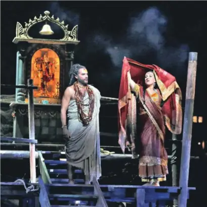  ?? Ken Howard, Metropolit­an Opera ?? Nicolas Testé as Nourabad and Diana Damrau as Leila in Bizet’s “The Pearl Fishers.”