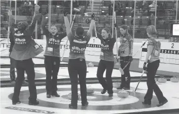 ?? MICHAEL OLEKSYN/MELFORT JOURNAL ?? Sherry Anderson’s team celebrates its victory at the 2018 provincial Scotties Tournament of Hearts in Melfort. The win marks Anderson’s seventh provincial title.