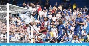  ?? ?? LONDON: Chelsea’s French-born Senegalese goalkeeper Edouard Mendy jumps to gather the ball from a deflected shot during an English Premier League match between Chelsea and West Ham United at Stamford Bridge on April 24, 2022. —AFP