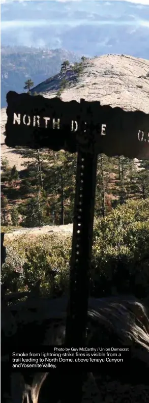  ?? Photo by Guy McCarthy / Union Democrat ?? Smoke from lightning-strike fires is visible from a trail leading to North Dome, aboveTenay­a Canyon andYosemit­e Valley,