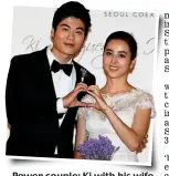  ?? GETTY IMAGES ?? Power couple: Ki with his wife, actress Han Hye-jin