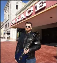  ?? RICHARD PAYERCHIN — THE MORNING JOURNAL ?? Vermilion musician Shawn Perry stands with his guitar outside the Lorain Palace Theater, 617 Broadway, Lorain. Perry will join with other bands for Cabin Fever 2020, a show 6p.m. Feb. 1at the Palace. Tickets cost $10.