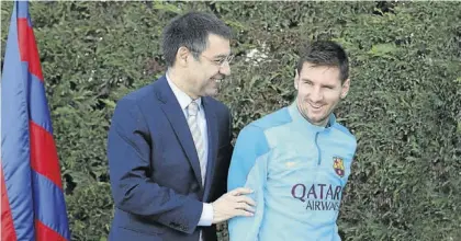  ??  ?? tomada en el año 2015 de Bartomeu, presidente del FC Barcelona, y Leo Messi.