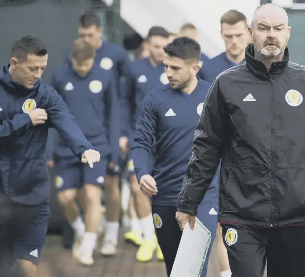  ??  ?? 0 Scotland manager Steve Clarke and his team prepare for tonight’s match with Russia, where Dundee United striker Lawrence Shankland, left, could be given his internatio­nal debut.