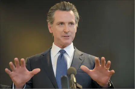  ?? RANDALL BENTON — THE ASSOCIATED PRESS ?? California Gov. Gavin Newsom speaks to members of the press at a news conference in Sacramento Thursday, Feb. 27. Newsom spoke about the state’s response to novel coronaviru­s, also known as COVID-19.