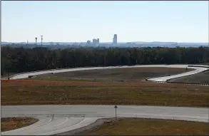  ?? (Arkansas Democrat-Gazette/Stephen Swofford) ?? The Arkansas State Police unveiled their new precision driving training track at Camp Robinson in North Little Rock during a ribbon-cutting ceremony on Thursday.