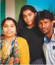  ??  ?? Shyne Muraleedha­ran, a driver at a school in Ajman, with his wife and daughter.