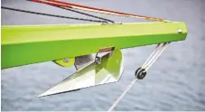  ??  ?? The bobstay and 2:1 tackline are integral, working through the bowsprit rather than dead-ending to either side. This allows the bobstay to be pulled back during anchoring